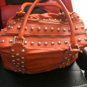 Orange rebeccaminkoff purse